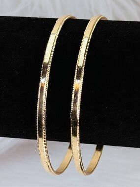 Goldtone set of two stacking bangle bracelets